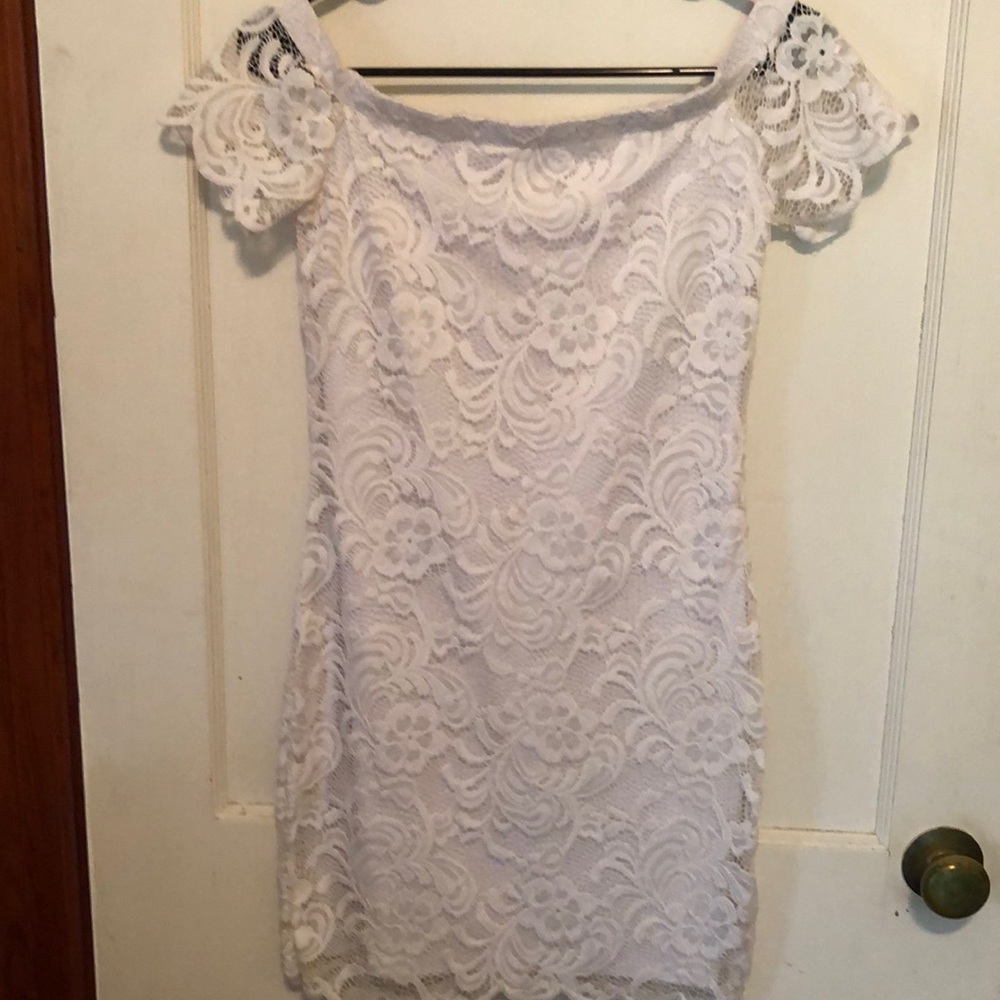 Fully lined off the shoulder lace dress. Size M